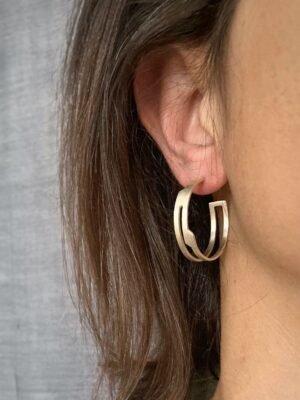 Modern sterling silver hoop earrings in architectural design
