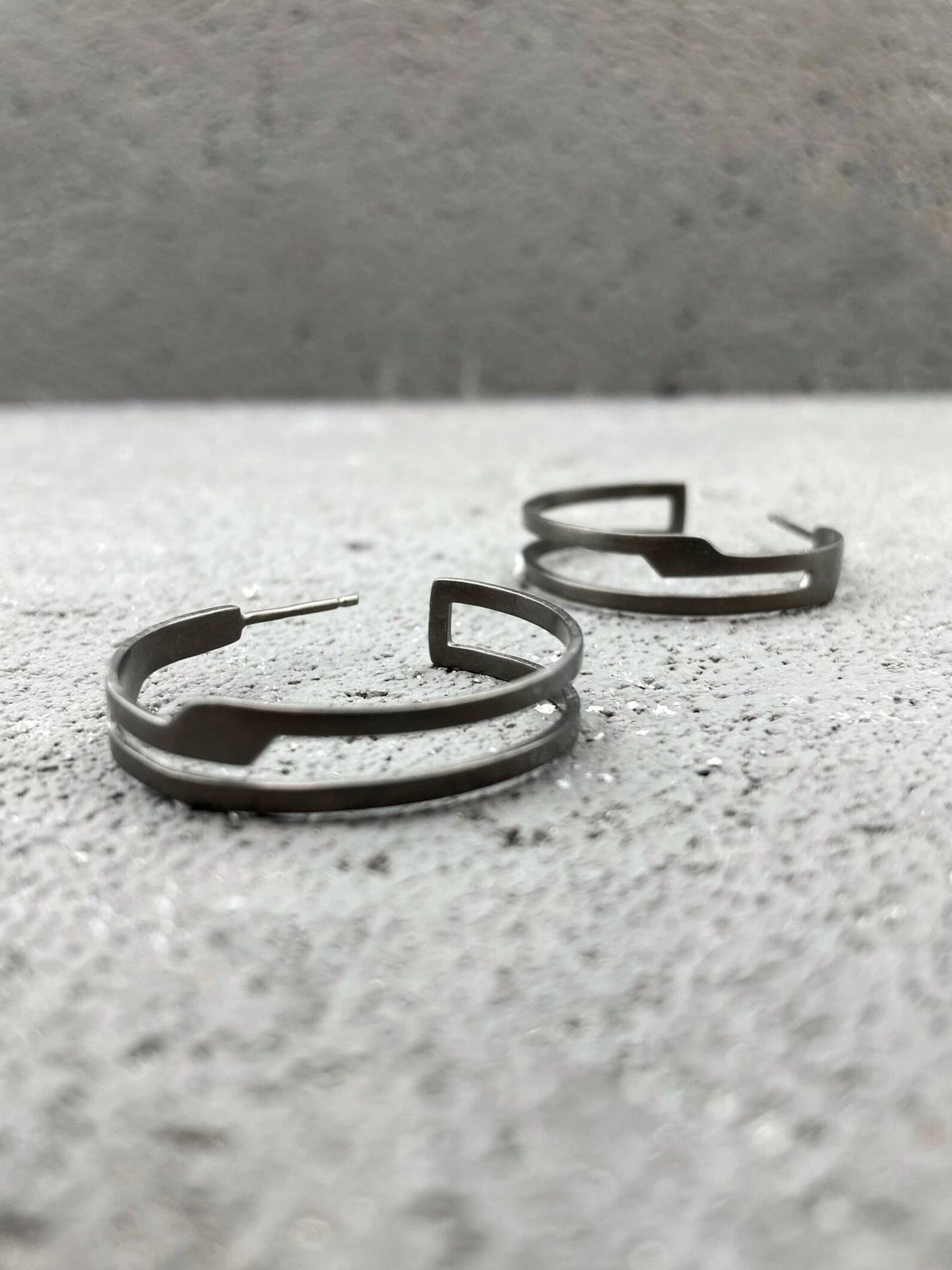 Modern sterling silver hoop earrings in architectural design plated with black rhodium