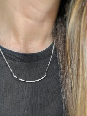 Second image of product: Asymmetrical sterling silver necklace with oxidized details in minimalist design