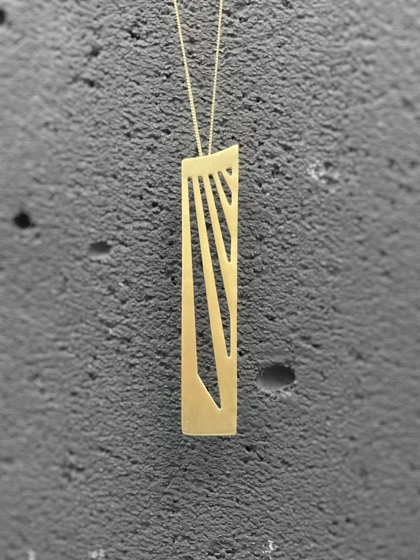 Long geometric pendant necklace in gold plated sterling silver