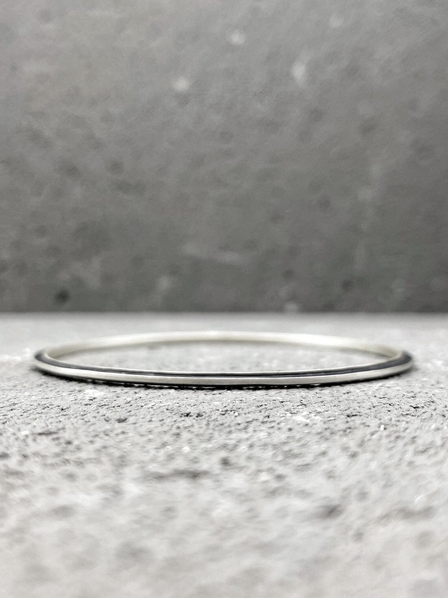 Modern bangle bracelet in oxidized sterling silver