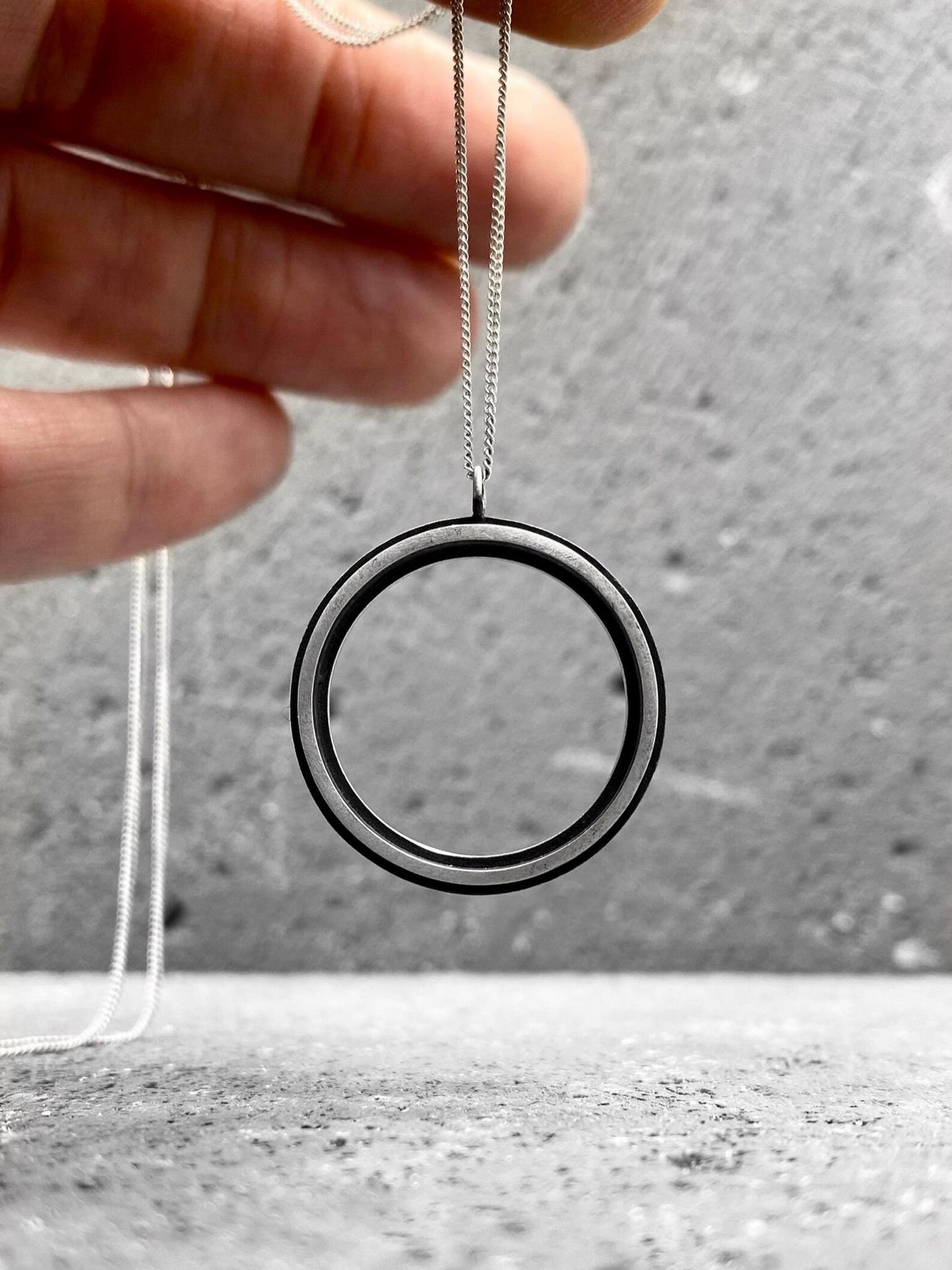 Modern round pendant necklace in oxidized sterling silver