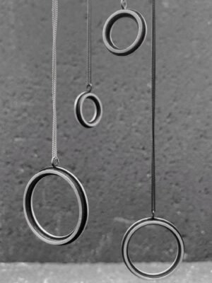 Second image of product: Modern round pendant necklace in oxidized sterling silver