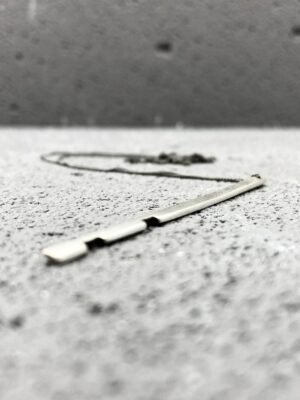 Long pendant necklace with oxidised details in sterling silver