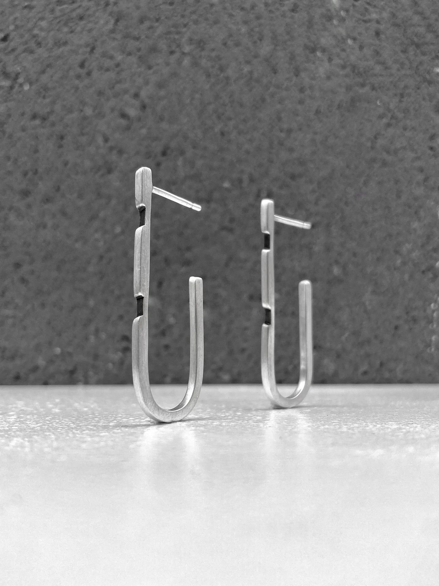 Second image of product: Modern sterling silver hoop earrings with oxidized details