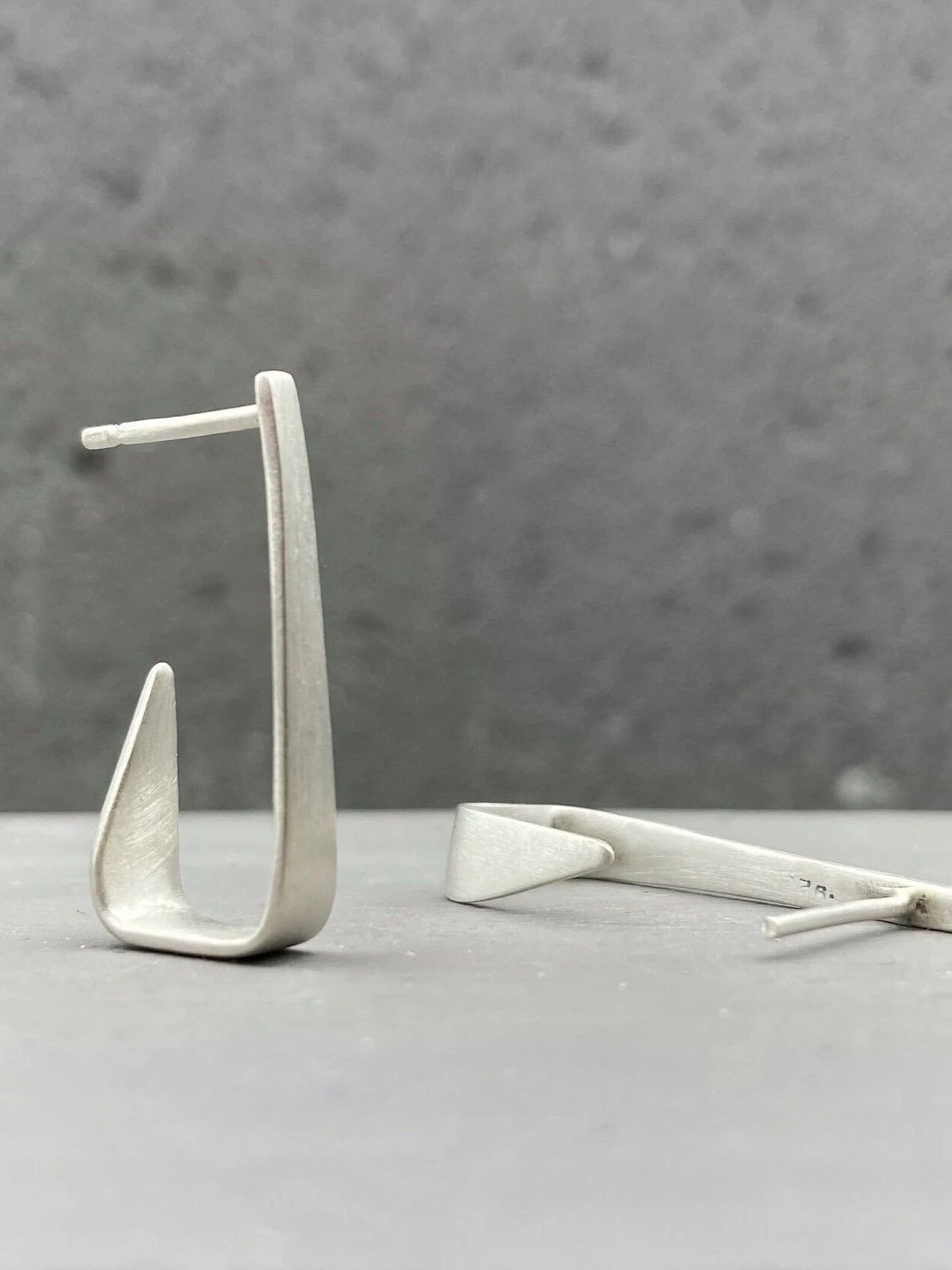 Third image of product: Small minimalist stud earrings in sterling silver