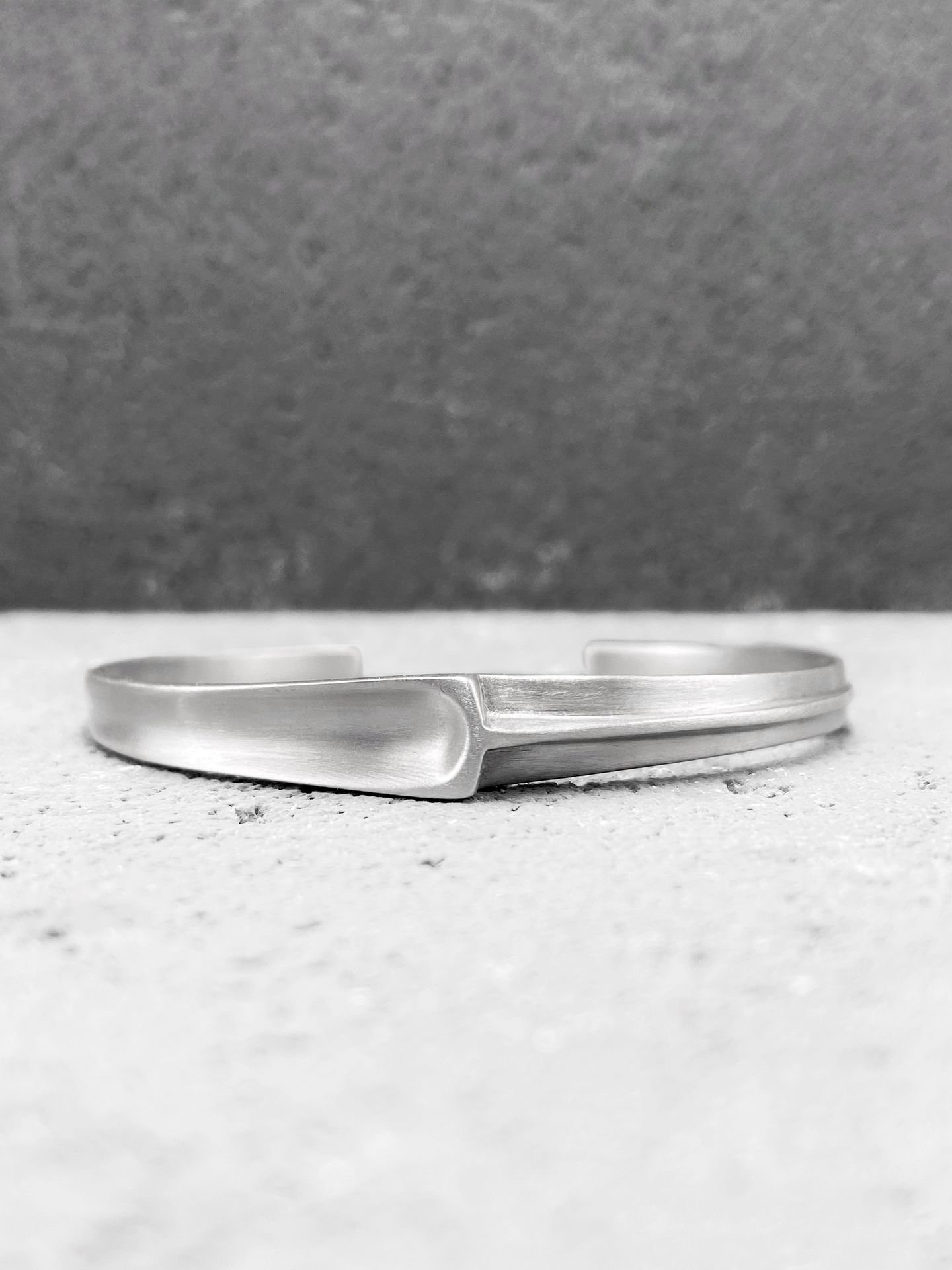 Fifth image of product: Asymmetrical modern cuff bracelet in sterling silver