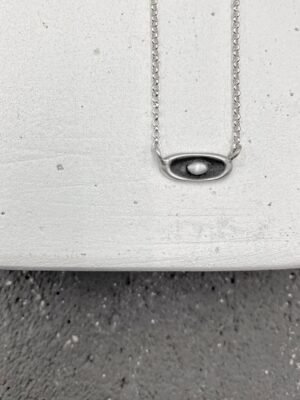 Evil eye necklace in oxidized sterling silver